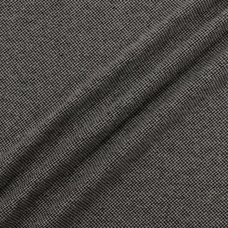 draped lines on surface of black and white mini-herringbone suiting