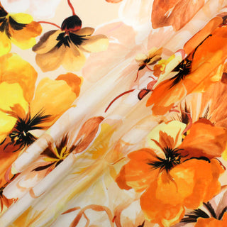 three diagonal lines draped of a painterly pansy silk chiffon fabric of orange and yellow