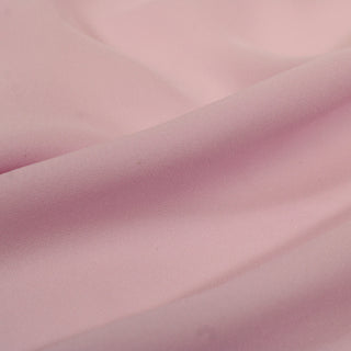 close-up of pale orchid colored silk chiffon fabric, detailing the matte face and soft drape