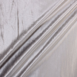 three diagonal lines draped of a pearlescent velveteen fabric with subtle textural lines throughout it; greyish-white color but really has a lot of multicolor interpretations to the iridescence