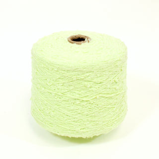 large cone of pale pear colored slub yarn of a fine-gauge