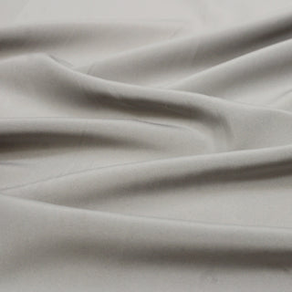 close-up of a lightweight synthetic pewter grey colored lining fabric