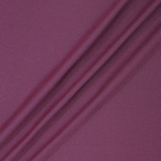 muted pink double-knit jersey fabric rumpled to show drape