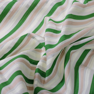 close-up of pink, green, and white stripe fabric, showing its weave structure and slightly transparent quality