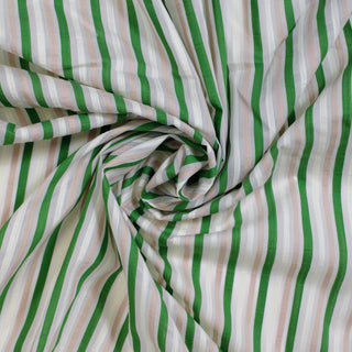 swirl of pink, green, and white stripe fabric