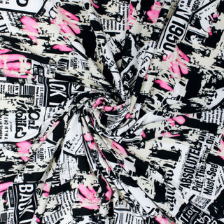 swirl of lightweight jersey fabric with a newsprint jersey fabric