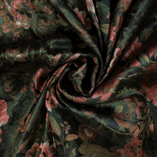 swirl of dark green and raspberry pink colored floral jacquard-woven fabric