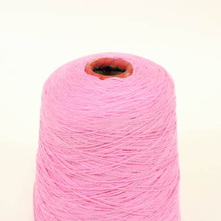 close-up of a cone of rose pink worsted sportweight yarn