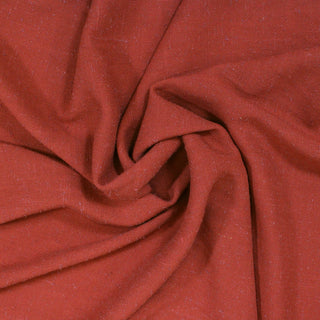 swirl of rust slub hopsack fabric to show dimensionality and drape