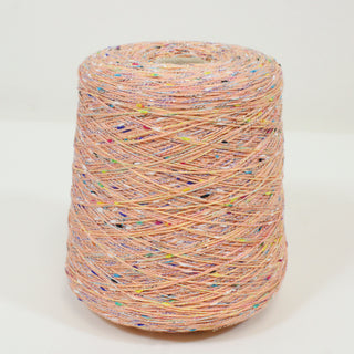 cone of lightweight salmon yarn with multicolor flecks and lurex filament