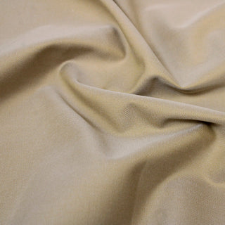 close-up of sand colored twill fabric, detailing the weave