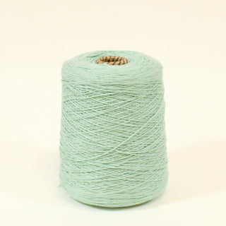 cone of lightweight seafoam colored core yarn