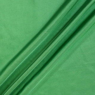 three diagonal lines draped of a seaweed green colored silk mikado fabric