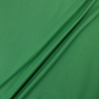 three diagonal lines draped of a shamrock green colored jersey fabric
