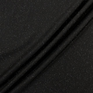 three diagonal lines of a lightweight black synthetic jersey fabric with silver lurex threads flecked throughout