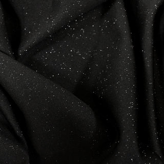 Close-up of black lightweight synthetic jersey fabric with small silver flecks knit throughout