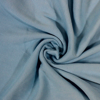 swirl of sky blue colored rib knit jersey fabric