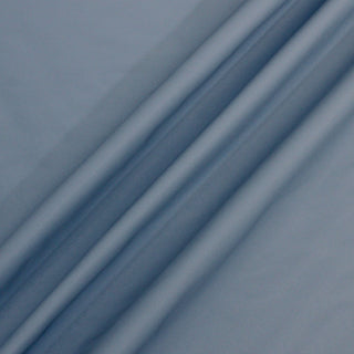 sky blue color textured vinyl fabric with an embossed twill weave texture, three lines arranged across its surface to show the structured flexibility