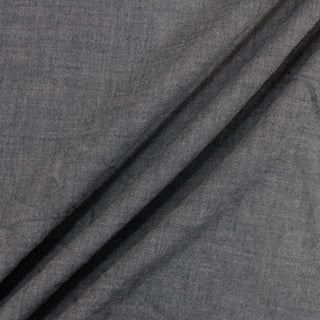 three diagonal lines draped of a slate grey chambray fabric