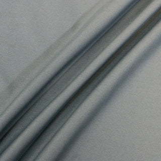 slate blue twill fabric with three lines arranged diagonally across it to demonstrate the midweight hand and subtle sheen