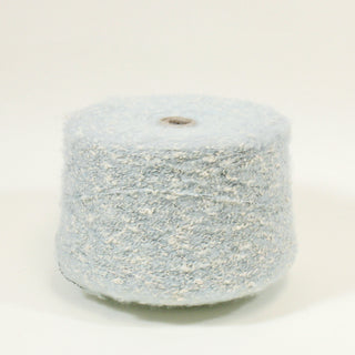 large cone of bulky, curly, fuzzy yarn, ice blue with white flecks