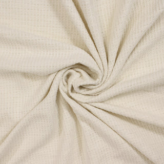 swirl of sparkly snowflake-white tweed fabric