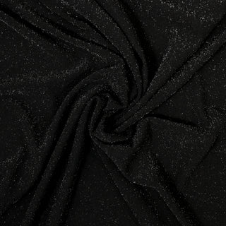 swirl of black knit fabric flecked with silver lurex threads
