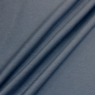 three diagonal lines draped of a steel blue twill fabric, detailing its more structured hand