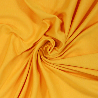 swirl of sunshine yellow colored rib knit jersey fabric