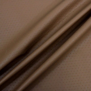 tawny tan colored pleather with embossed quilting-like pattern and forced draped peaks to show the structure and weight of the material