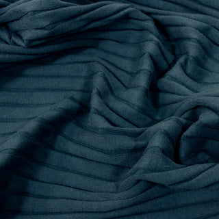 close-up of rumpled teal colored rib knit fabric, detailing the knit structure and midweight, stretchy quality