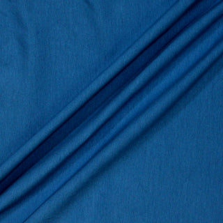 three diagonal lines draped of a thalo blue knit jersey fabric