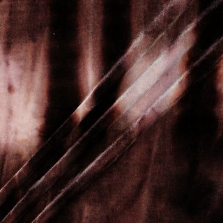 three diagonal lines draped of a tie-dye fig velour fabric