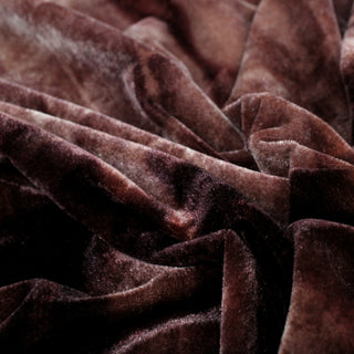 close-up of fig colored tie-dye velour fabric