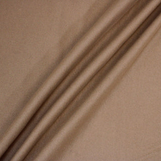 toffee color felted wool interlock fabric rumpled up to show hand and drape