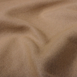 close-up of felted wool interlock fabric, showing a detailed look at the knit stitches and fabric texture