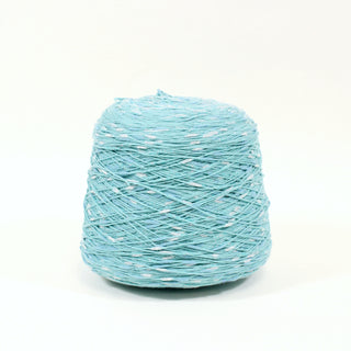 large cone of blue, white, and silver flecked slub yarn for knitting