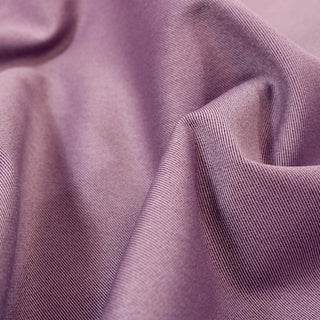 close-up of orchid colored twill fabric, showing the two-tone quality