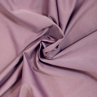 stiff swirl of orchid colored twill fabric