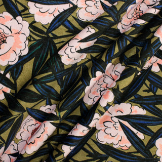 three draped lines of a floral printed velveteen upholstery fabric