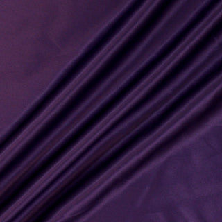 three diagonal lines draped of a violet silk charmeuse fabric