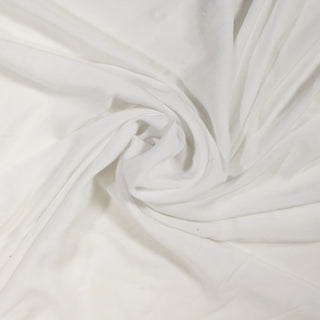 swirl of white broadcloth fabric demonstrating drape