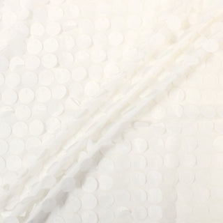 three diagonal lines draped of white fabric-sequined crepe fabric