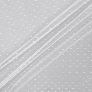 three diagonal lines draped of white polka dot mesh fabric over a grey background