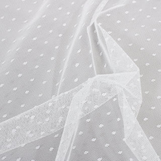 close-up of white polka dot mesh fabric