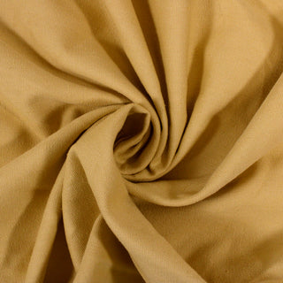 stiff swirl of pale yolk yellow colored duck canvas fabric