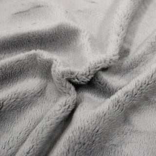 close-up of short pile grey colored faux fur fabric