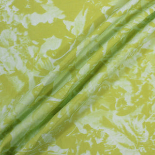 three diagonal lines draped of a green and blue abstract synthetic fabric