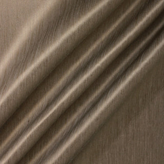 Three lines draped of an antique gold upholstery fabric.