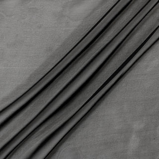 three diagonal lines draped of a very lightweight/sheer silk chiffon fabric in obsidian black